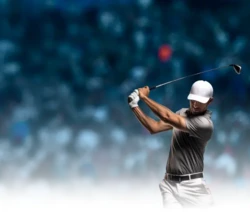 Golfer swinging club